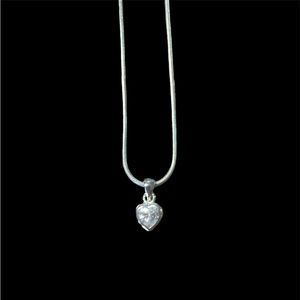 Necklace with heart shaped pendant